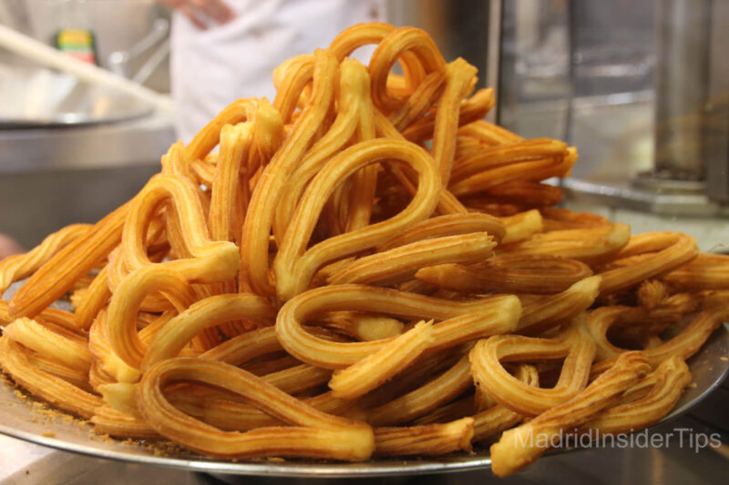 Churros, a close shot, as part of the list of Best Desserts to Try in Madrid Spain